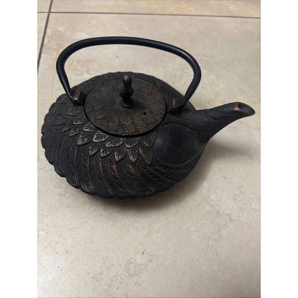 Cast Iron Teapot Pelican on Lid Embossed Feathers Motif Enamel Porcelain Inside